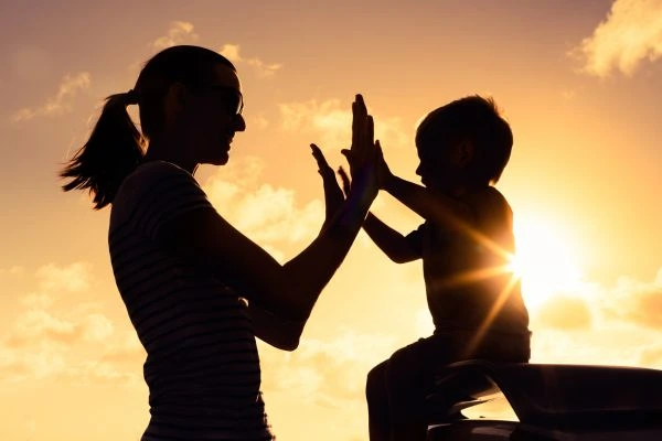 Image of happy mother and child after resolving child arrangements Rhyl